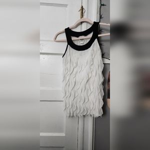 White ruffled top